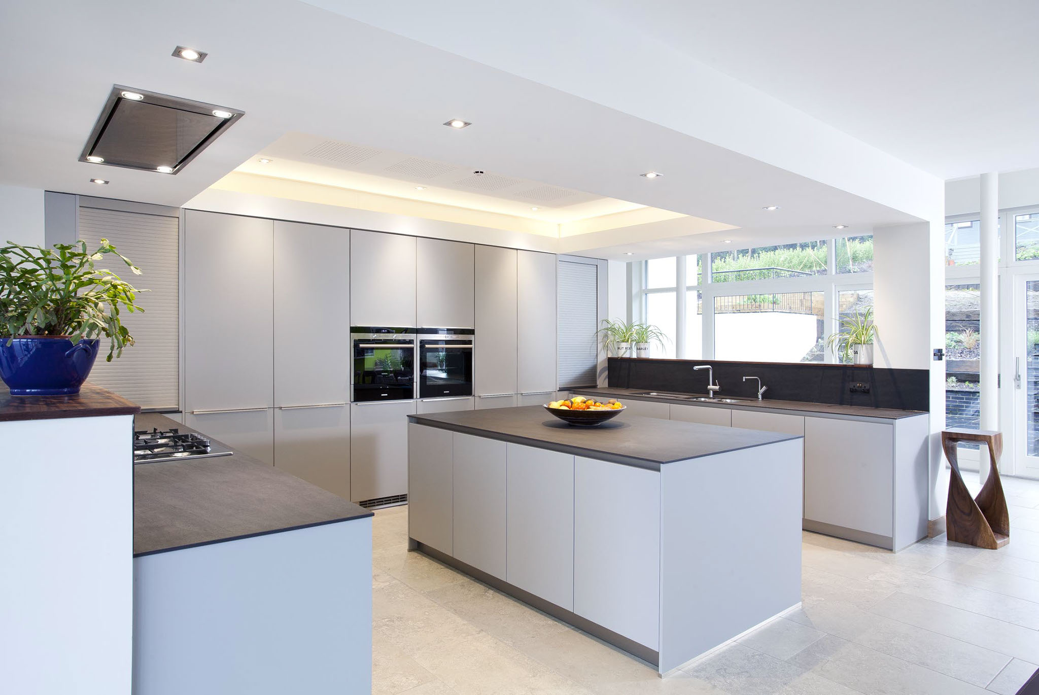 Grey contemporary German kitchen with matt lacquered doors