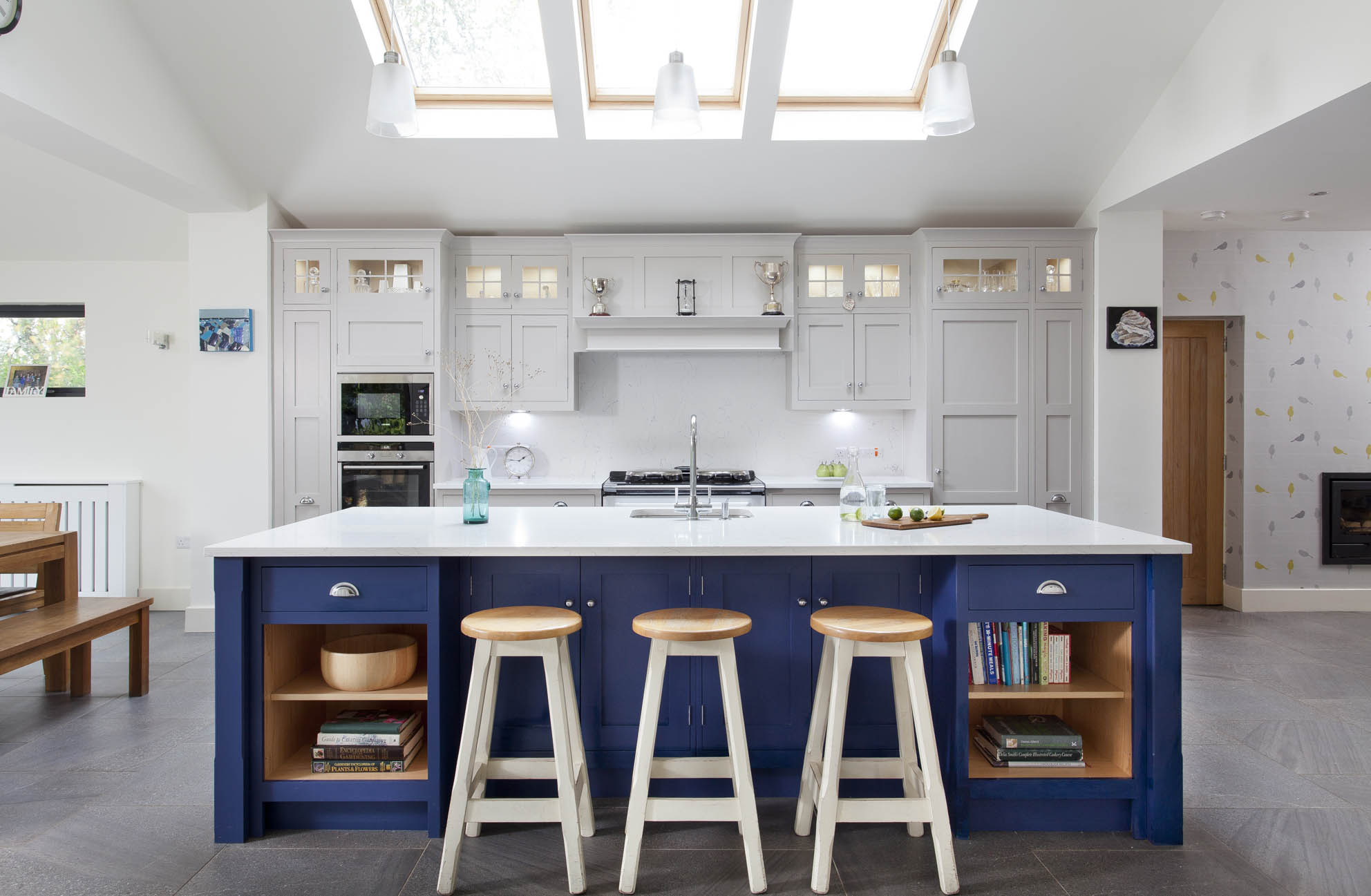 White hi gloss kitchen with coffee station and hidden utility