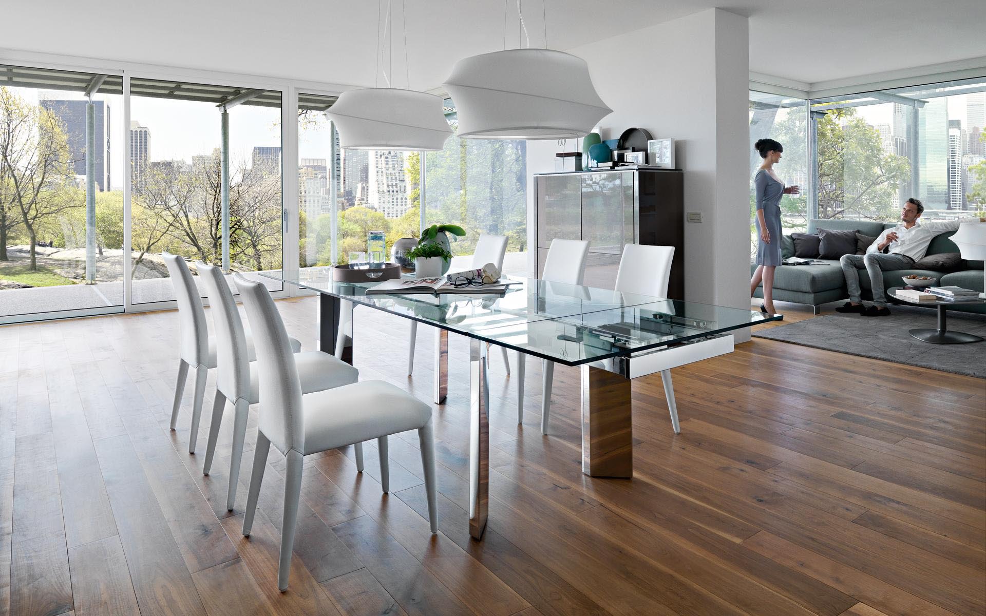 Glass calligaris dining table and chairs in contemporary space