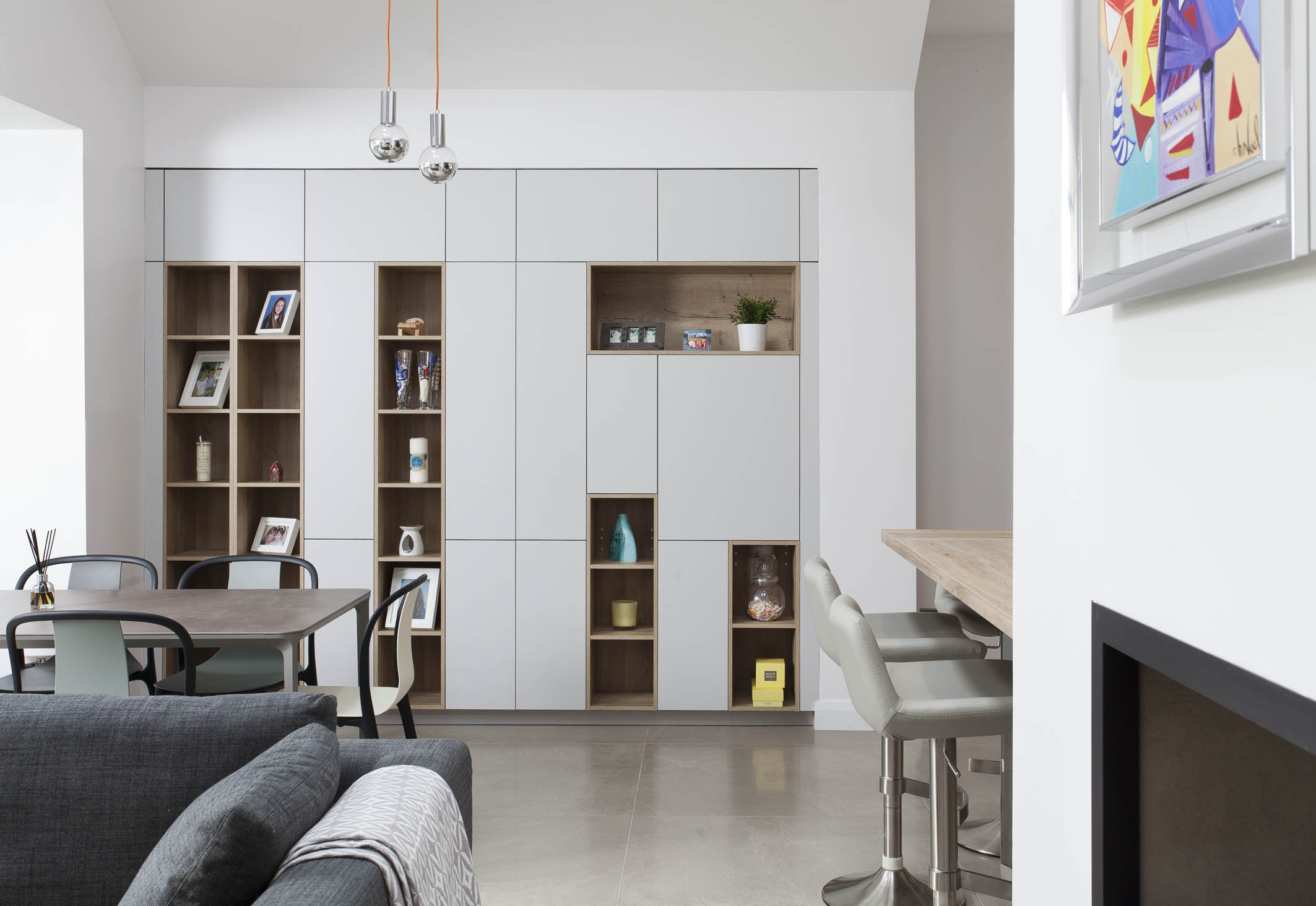 White hi gloss kitchen with coffee station and hidden utility