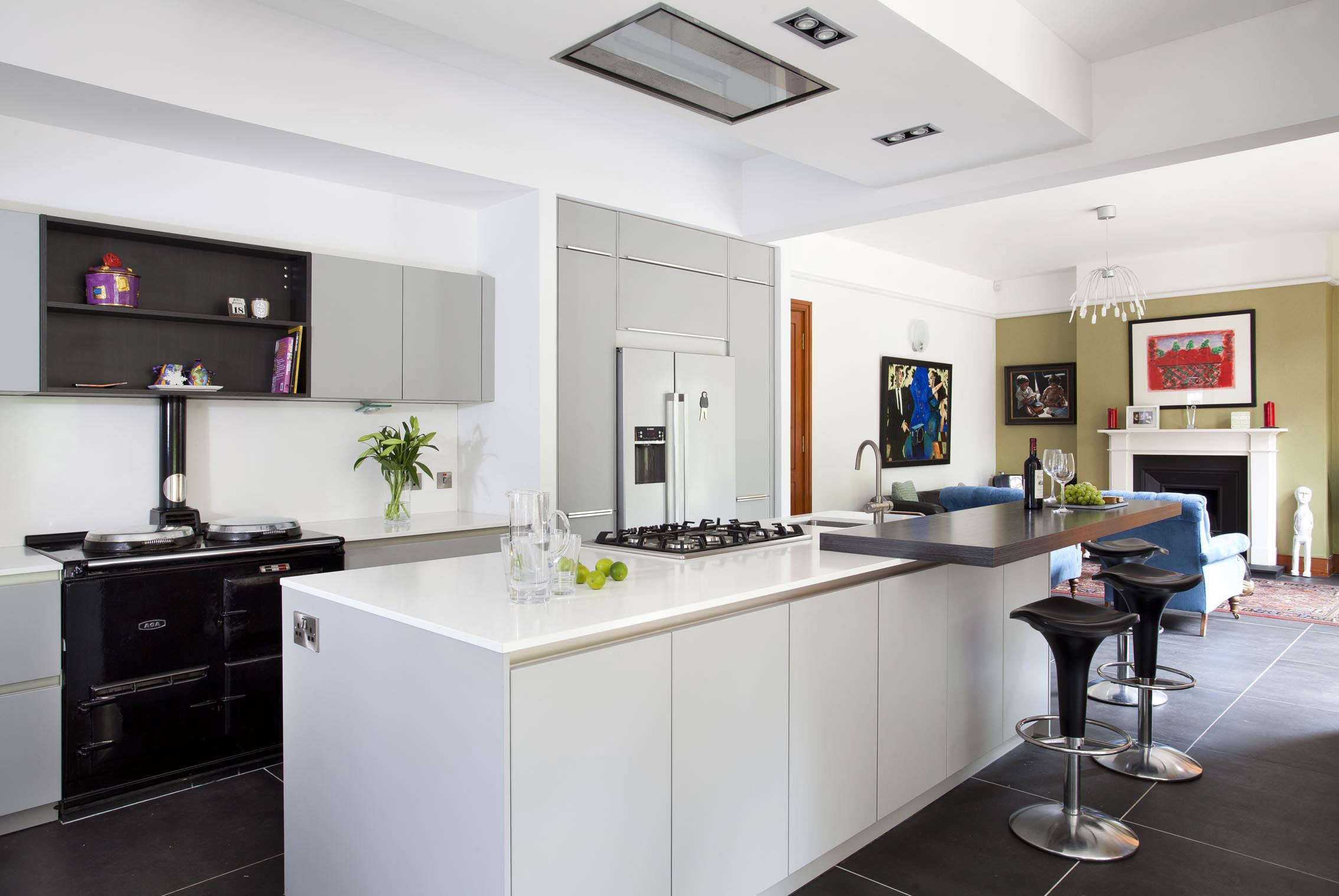 GREY SCHULLER KITCHEN WITH BLACK AGA AND FIREPLACE